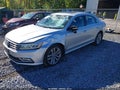2017 Volkswagen Passat — photo 2 of 16 | VIN 1VWGT7A3XHC031299