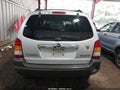 2004 Mazda Tribute — photo 17 of 17 | VIN 4F2YZ04174KM22580