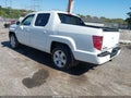 2010 Honda Ridgeline — photo 3 of 16 | VIN 5FPYK1F5XAB010101
