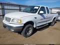 1999 Ford F-150 — photo 2 of 14 | VIN 1FTRX18L6XKB35215