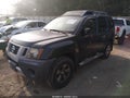 2009 Nissan Xterra — photo 2 of 11 | VIN 5N1AN08W59C508373