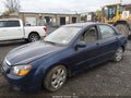 2009 Kia Spectra — photo 2 of 12 | VIN KNAFE222895637799