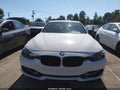 2014 BMW 3 Series — photo 6 of 16 | VIN WBA3C1C59EK106571