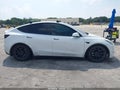 2022 Tesla Model Y — photo 13 of 18 | VIN 7SAYGDEE7NF386535