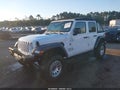 2018 Jeep Wrangler Unlimited — photo 2 of 16 | VIN 1C4HJXDG9JW151367