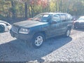 2004 Jeep Grand Cherokee — photo 2 of 11 | VIN 1J4GW48S34C267111