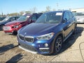 2018 BMW X1 — photo 12 of 16 | VIN WBXHU7C36J3H43208