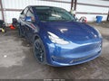 2022 Tesla Model Y — photo 1 of 18 | VIN 7SAYGDEE2NF458676