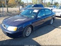 2004 Subaru Legacy — photo 2 of 11 | VIN 4S3BE625947210373