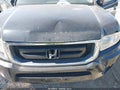 2009 Honda Ridgeline — photo 6 of 11 | VIN 5FPYK16209B105669