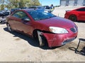 2009 Pontiac G6 — photo 1 of 16 | VIN 1G2ZH36N894115654