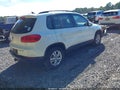 2017 Volkswagen Tiguan — photo 4 of 13 | VIN WVGAV7AXXHK026398