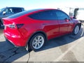 2022 Tesla Model Y — photo 4 of 20 | VIN 7SAYGAEEXNF416156