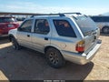 2000 Isuzu Rodeo — photo 3 of 11 | VIN 4S2DM58W4Y4347691