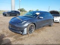 2022 Tesla Model 3 — photo 2 of 15 | VIN 5YJ3E1EA9NF104727