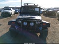 2001 Jeep Wrangler — photo 12 of 16 | VIN 1J4FA49S71P323564