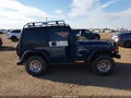 2001 Jeep Wrangler — photo 13 of 16 | VIN 1J4FA49S71P323564