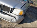 2004 GMC Envoy — photo 13 of 14 | VIN 1GKDT13S542419097