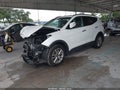 2014 Hyundai Santa Fe — photo 2 of 16 | VIN 5XYZU3LA8EG210932