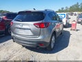 2014 Mazda CX-5 — photo 4 of 16 | VIN JM3KE4DY3E0408038