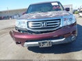 2013 Honda Pilot — photo 12 of 17 | VIN 5FNYF4H97DB066743
