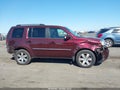 2013 Honda Pilot — photo 13 of 17 | VIN 5FNYF4H97DB066743