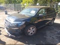 2018 Honda Pilot — photo 2 of 15 | VIN 5FNYF6H57JB008426