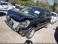 2007 Kia Sportage — photo 2 of 15 | VIN KNDJF724X77347977