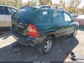 2007 Kia Sportage — photo 4 of 15 | VIN KNDJF724X77347977