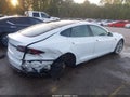 2015 Tesla Model S — photo 4 of 20 | VIN 5YJSA1H28FF083821