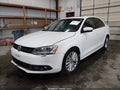 2013 Volkswagen Jetta — photo 2 of 16 | VIN 3VWLP7AJ9DM398835