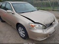 2002 Toyota Camry — photo 13 of 14 | VIN 4T1BE32KX2U055458