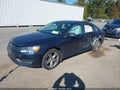 2014 Volkswagen Passat — photo 2 of 16 | VIN 1VWBT7A35EC064698
