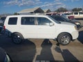 2015 Honda Pilot — photo 14 of 17 | VIN 5FNYF3H48FB025359