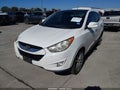 2011 Hyundai Tucson — photo 2 of 13 | VIN KM8JU3AC3BU220856