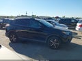 2018 Toyota RAV4 — photo 13 of 16 | VIN 2T3WFREV7JW456771