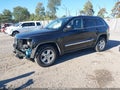 2013 Jeep Grand Cherokee — photo 2 of 17 | VIN 1C4RJFAGXDC583717