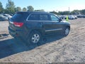 2013 Jeep Grand Cherokee — photo 4 of 17 | VIN 1C4RJFAGXDC583717