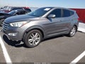 2013 Hyundai Santa Fe — photo 2 of 16 | VIN 5XYZWDLA7DG064425