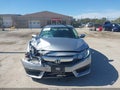 2018 Honda Civic — photo 12 of 16 | VIN 19XFC2F7XJE035493