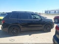 2024 Honda Passport — photo 13 of 16 | VIN 5FNYF8H80RB016627