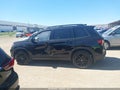 2024 Honda Passport — photo 14 of 16 | VIN 5FNYF8H80RB016627