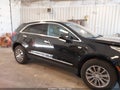 2018 Cadillac XT5 — photo 13 of 16 | VIN 1GYKNDRSXJZ166474
