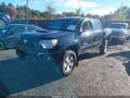 2014 Toyota Tacoma — photo 2 of 17 | VIN 3TMLU4EN1EM153259