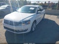 2014 Volkswagen Passat — photo 2 of 15 | VIN 1VWBN7A34EC089344