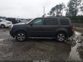2014 Honda Pilot — photo 14 of 17 | VIN 5FNYF3H59EB019917