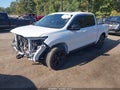 2022 Honda Ridgeline — photo 2 of 16 | VIN 5FPYK3F83NB023011
