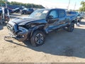 2021 Toyota Tacoma — photo 2 of 16 | VIN 3TMDZ5BN5MM102992