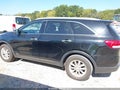2016 Kia Sorento — photo 14 of 16 | VIN 5XYPGDA30GG079930