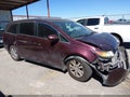 2014 Honda Odyssey — photo 14 of 17 | VIN 5FNRL5H4XEB066955